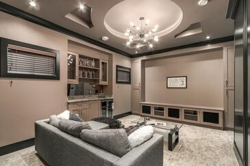 Modern hall with chandelier and sofa